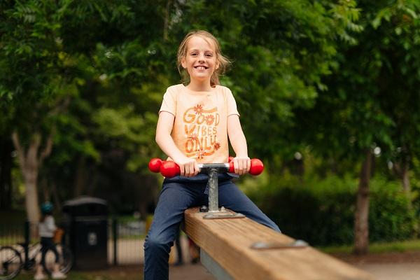 Girl on a seesaw